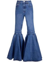 Alaïa - High-waisted Flared Jeans - Lyst