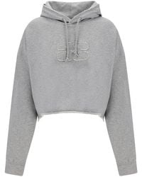 Ganni - Logo Embroidered Drawstring Cropped Hoodie - Lyst