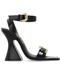 Versace - Logo Buckle Heeled Sandals - Lyst