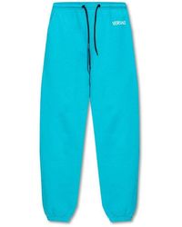 Versace - Blue Sweatpants With Logo - Lyst