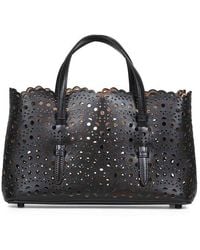 Alaïa - Vienne Perforated Open Top Handbag - Lyst