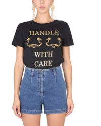 Moschino - T-shirt " Handle With Care" - Lyst