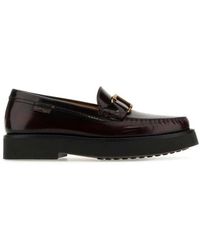 Tod's - Logo Plaque Round Toe Loafers - Lyst