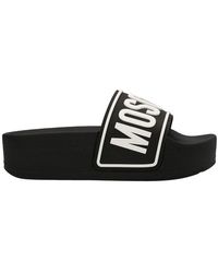 Moschino Logo Rubber Pool Slide in Black Blue - Save 1% Womens Flats and flat shoes Moschino Flats and flat shoes 