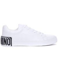 Moschino - Logo-embossed Lace-up Sneakers - Lyst