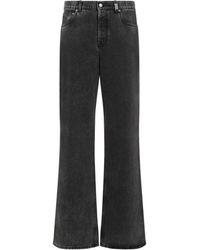 Alexander McQueen - Logo Patch Wide-leg Jeans - Lyst