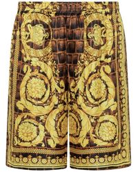 Versace - Pants & Shorts - Lyst