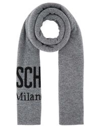 - Save 31% Womens Scarves and mufflers Moschino Scarves and mufflers Moschino Double Question Mark Cashmere Scarf in Brown Green 