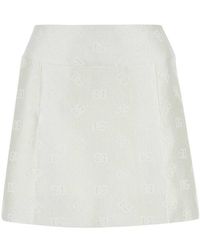 Dolce & Gabbana - Dg Logo Quilted Jacquard Mini Skirt - Lyst
