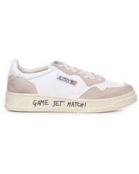 Autry - Slogan Printed Low-Top Sneakers - Lyst