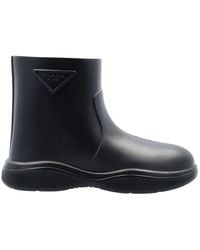 Prada Logo Embossed Slip-on Rain Boots - Black