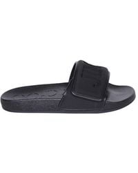 Jimmy Choo - Logo-Embossed Slip-On Sandals - Lyst