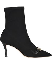gucci boots with snake on bottom