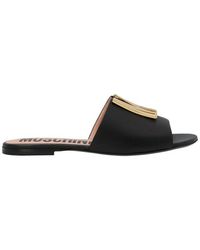 Moschino Rubber Slide Sandals in Nero (Black) - Save 67% | Lyst