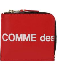 comme des garcons passport holder