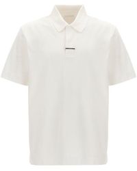 Givenchy - Metal Clip Short-sleeved Polo Shirt - Lyst