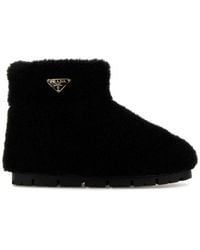 Prada - Triangle Logo Shearling Ankle Boots - Lyst