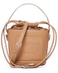 V73 - Beatrix Logo Embossed Drawstring Bucket Bag - Lyst