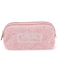 Versace - Logo-embroidered Jacquard Zip-up Toiletry Bag - Lyst