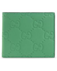 Gucci - gg Logo-debossed Leather Wallet - Lyst