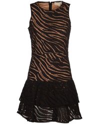 MICHAEL Michael Kors - Zebra Eyelet Ruffled Mini Dress - Lyst