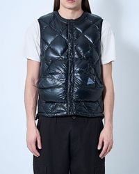 and wander - Quilted Down Jacket - Lyst