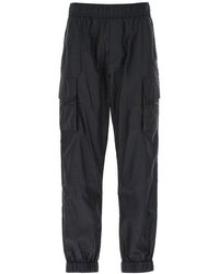 Valentino - Logo All-Over Printed Cargo Pants - Lyst
