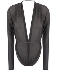 Saint Laurent - Belted V-Neck Long-Sleeved Jumpsuit - Lyst