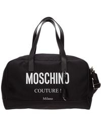 Moschino - Logo Printed Duffle Bag - Lyst