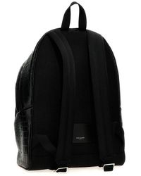 Saint Laurent Ysl City Star Embossed Backpack in Black for