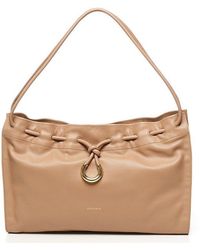Coccinelle - Logo Detailed Drawstring Shoulder Bag - Lyst