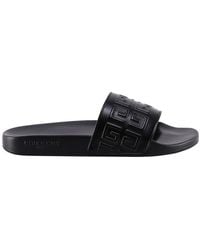 Givenchy - Embossed Paris Flat Sandals - Lyst