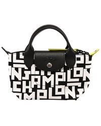 Longchamp Top-handle bags for Women - Up to 36% off at Lyst.com