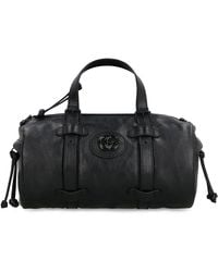 Gucci - GG Debossed Top-handle Small Travel Bag - Lyst