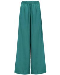 Adidas originals x danielle cathari deconstructed track pants in green best sale