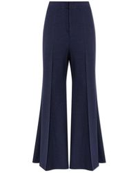 Victoria Beckham - Wool-Blend Flared Formal Trousers - Lyst