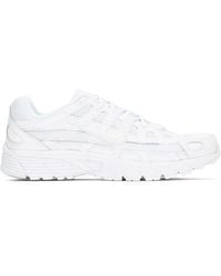 nike training flex trainers in grey with peach swoosh