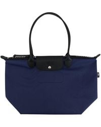 Longchamp - Large Le Pliage Energy Top Handle Bag - Lyst
