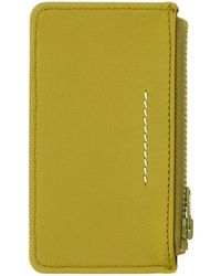 Save 23% MM6 by Maison Martin Margiela Leather Bifold Wallet in Yellow Womens Wallets and cardholders MM6 by Maison Martin Margiela Wallets and cardholders 