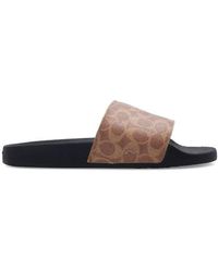 COACH Sandals, slides and flip flops 