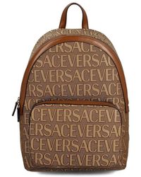 Versace - Allover Logo Printed Backpack - Lyst