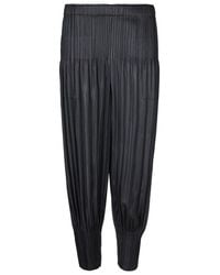 Issey Miyake - Pleated Tapered Trousers - Lyst