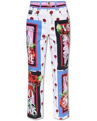 Versace - Graphic-printed Trousers - Lyst