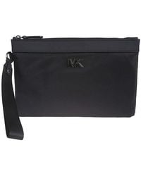 Michael Kors - Eli Logo Plaque Clutch Bag - Lyst