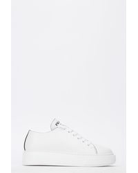 prada raised sole low tops white