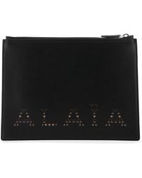 Alaïa - Logo Leather Zipped Pouch - Lyst