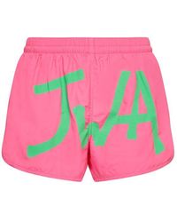 JW Anderson - Logo Printed Curved Hem Swim Shorts - Lyst