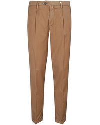 Myths - Tailored Tapered Pleat-detailed Trousers - Lyst
