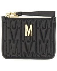 Moschino - Logo Plaque Quilted Zipped Clutch Bag - Lyst