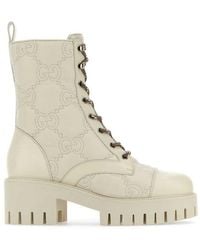 Gucci - Quilted-logo Leather Combat Boots - Lyst